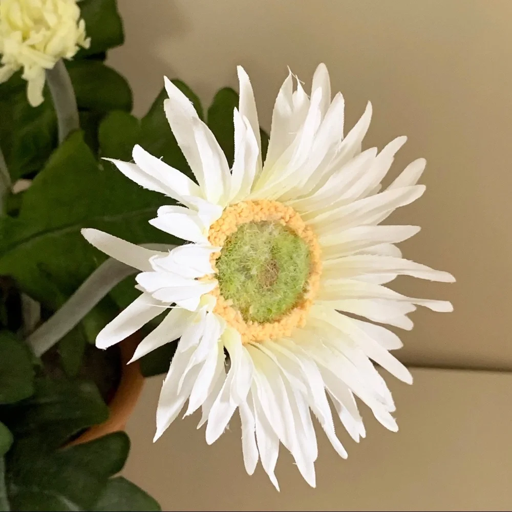 Large faux potted flowers